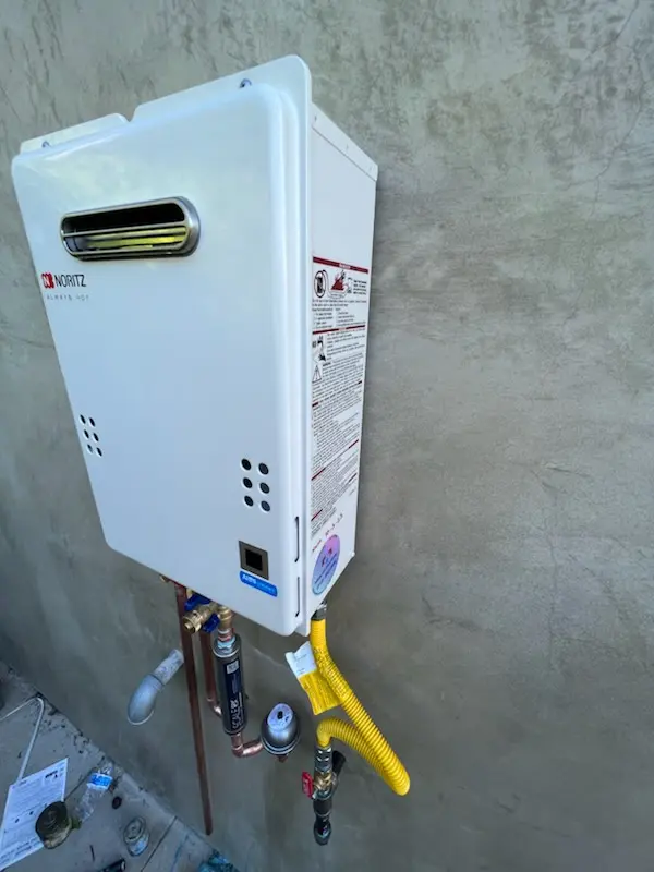 Tankless water heater installation for Tower Oaks Meadows homes